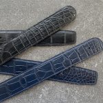 A pair of custom alligator belts crafted to fit customer’s buckes