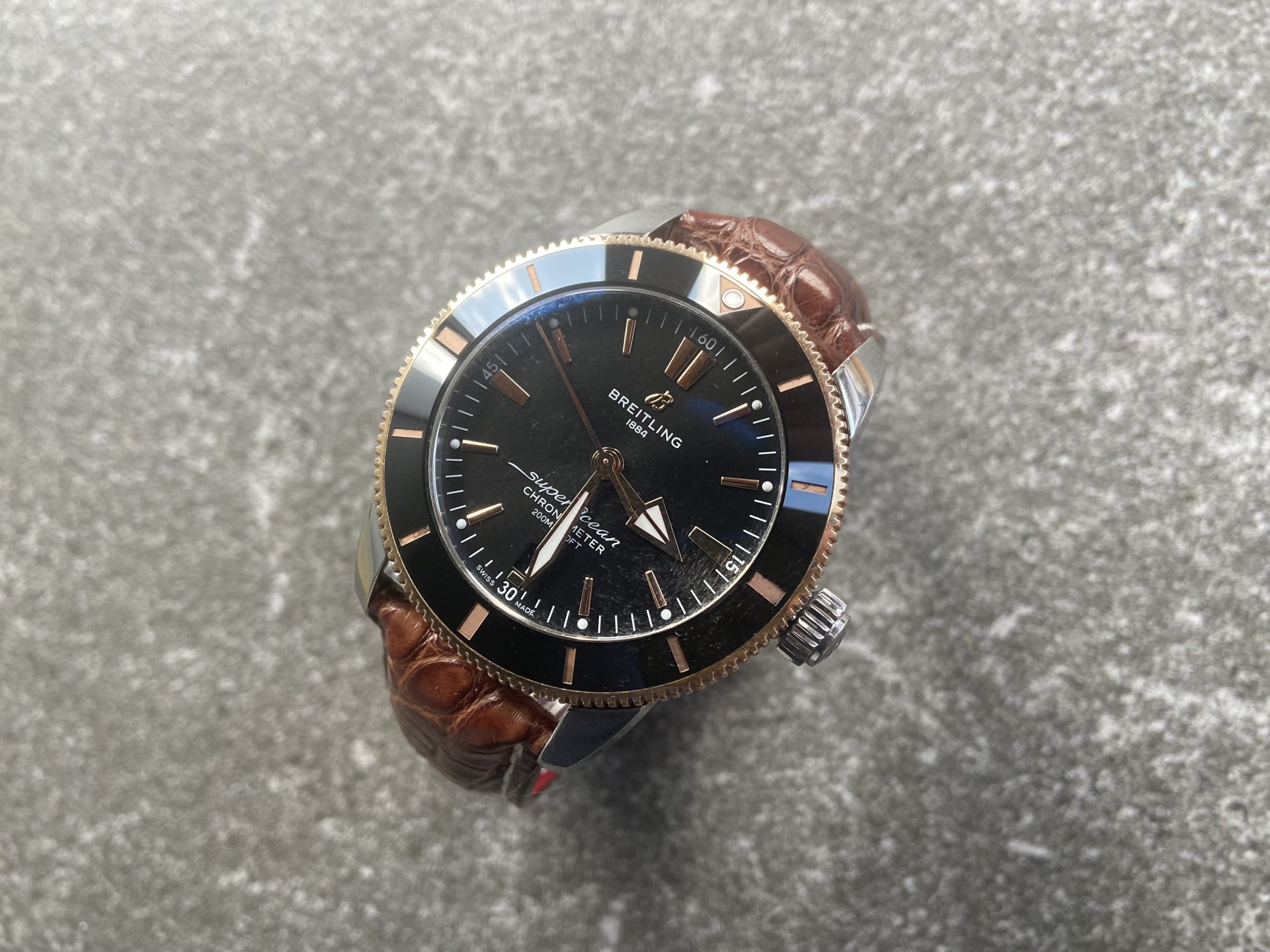 Breitling SuperOcean watch with custom cognac alligator leather strap
