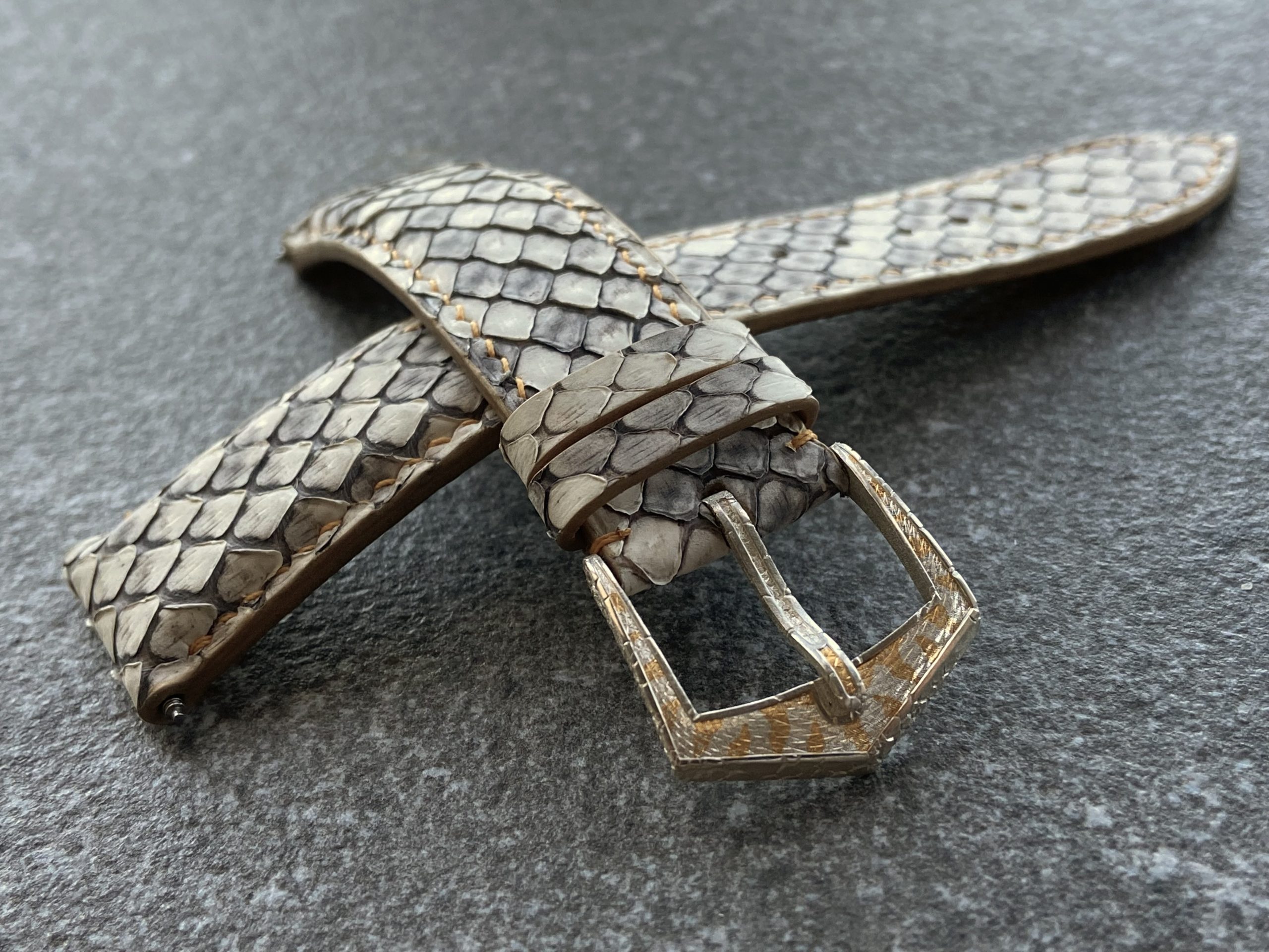 Anatomical watch strap made of natural python leather with hand-finished buckle