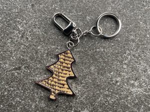 Tree-shaped key chain and bag charm with sand coloured scaled leather insert
