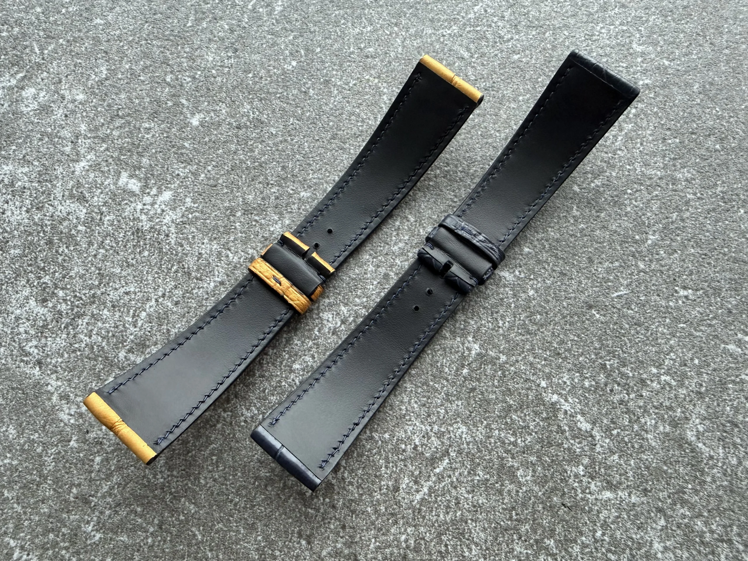 Back view of custom alligator leather watch straps for the Equilibrium project, showing ergonomic shape, reinforced lining, and stitching details