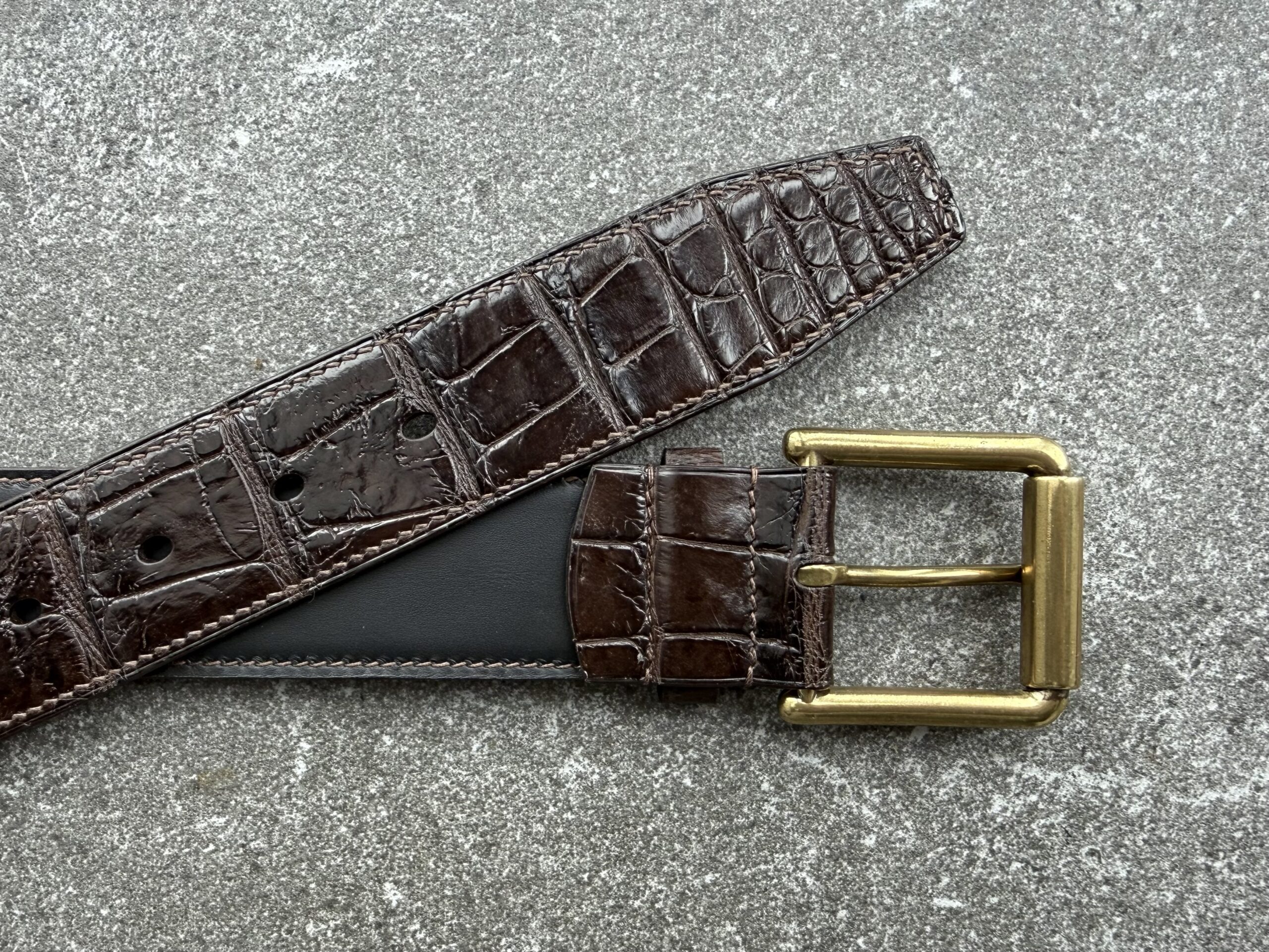 Alligator tail belt with black lining and solid brass sewn in buckle